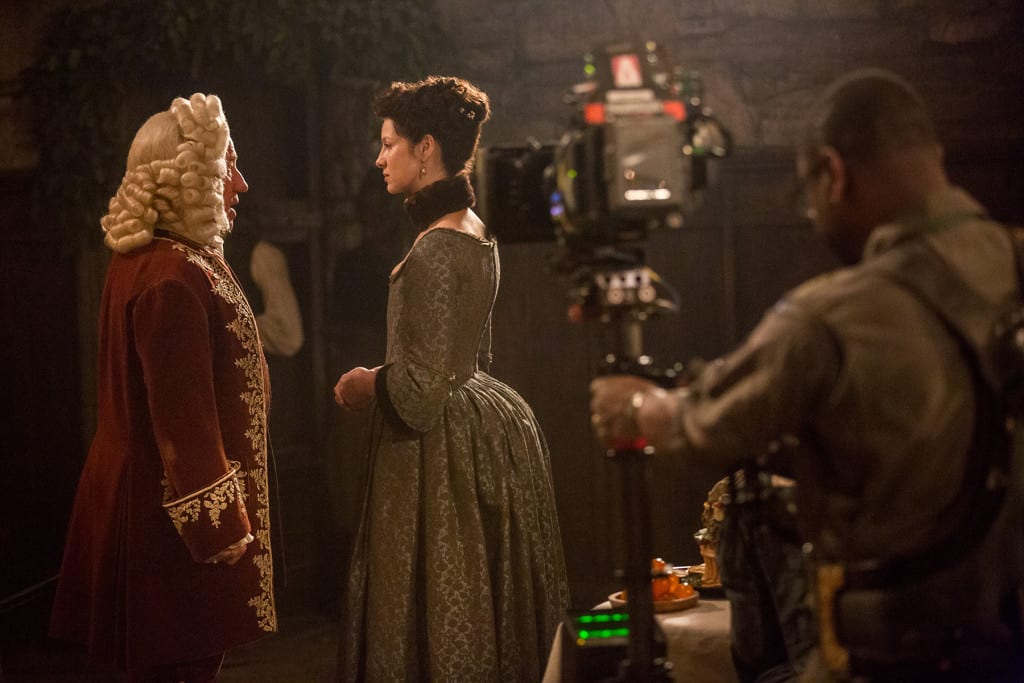 'Outlander' Season 1B  Behind the Scenes, Duke of Sandringham (Simon Callow) and Claire Randall Fraser (Caitriona Balfe)